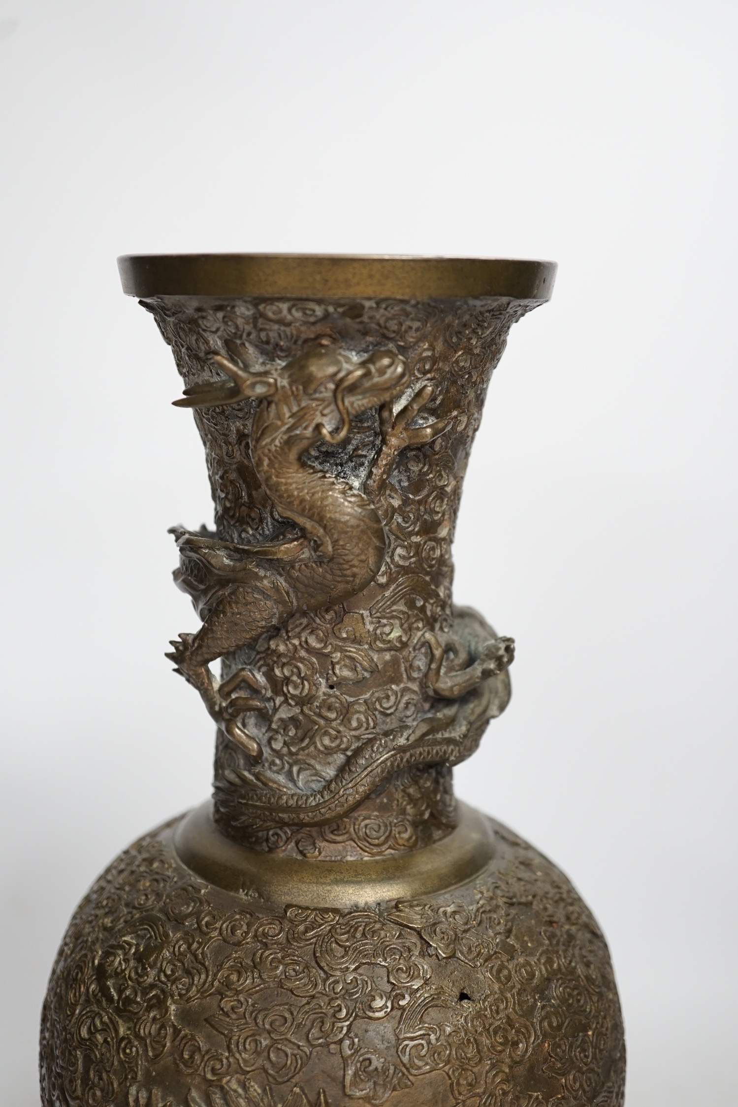 A 19th century Chinese or Japanese bronze ‘dragon’ vase, 33cm. Condition - fair